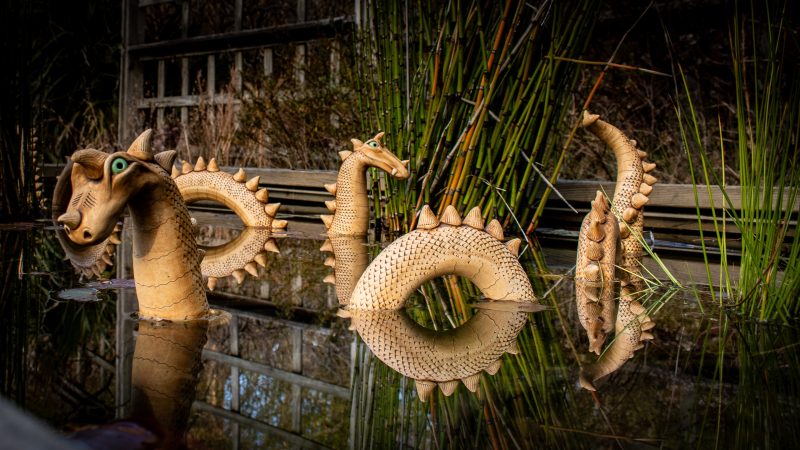 pottery sea dragons in a planter